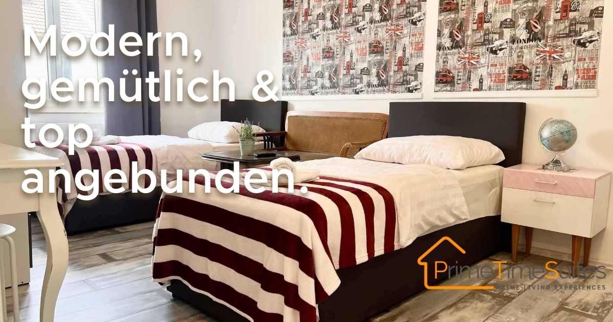 Bright twin room with stylish London décor and cosy seating area